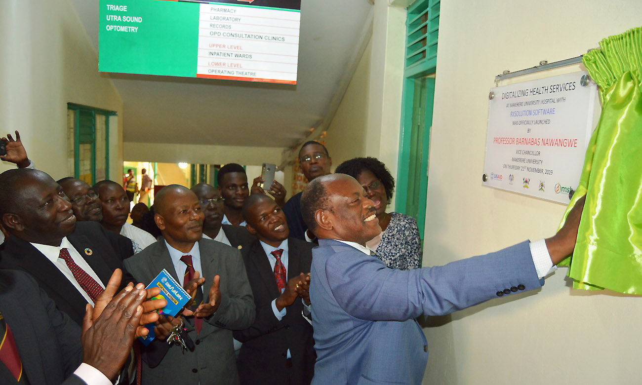 The Vice Chancellor-Prof. Barnabas Nawangwe (Right) unveils the plaque at the launch of the RxSolution Software on 21st November 2019, Makerere University Hospital, Makerere Hill off Gaddafi Road, Kampala Uganda.