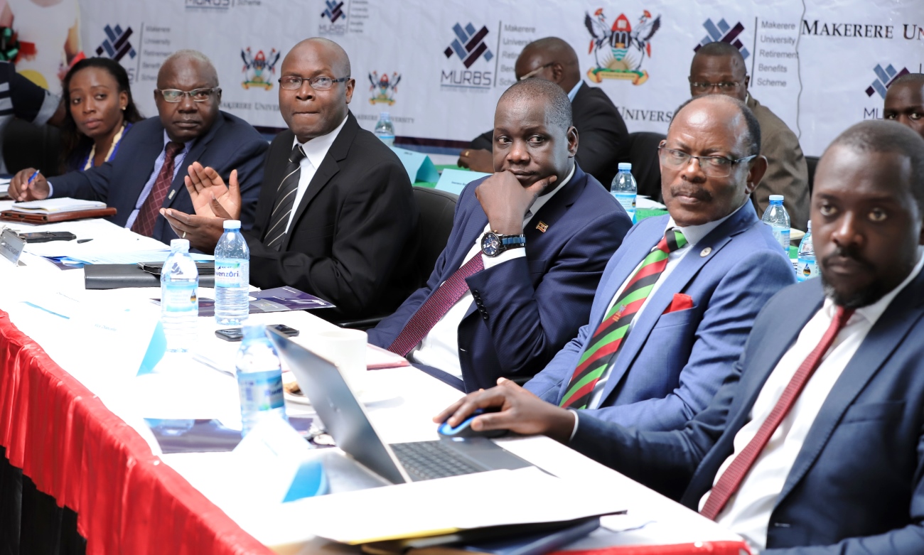 The Vice Chairperson Council-Rt. Hon. Daniel Fred Kidega (3rd Right), Vice Chancellor-Prof. Barnabas Nawangwe (2nd Right), Ag. University Secretary-Mr. Yusuf Kiranda (Right), MURBS Chairperson BoT-Mr. Grace William Naigambi (3rd L), Chair MURBS Audit Committee-CPA David Ssenoga (2nd Left) and Principal Pension Officer MURBS-Ms. Susan Khaitsa (Left) at the Scheme's performance presentation, 11th October 2019, Makerere University, Kampala Uganda