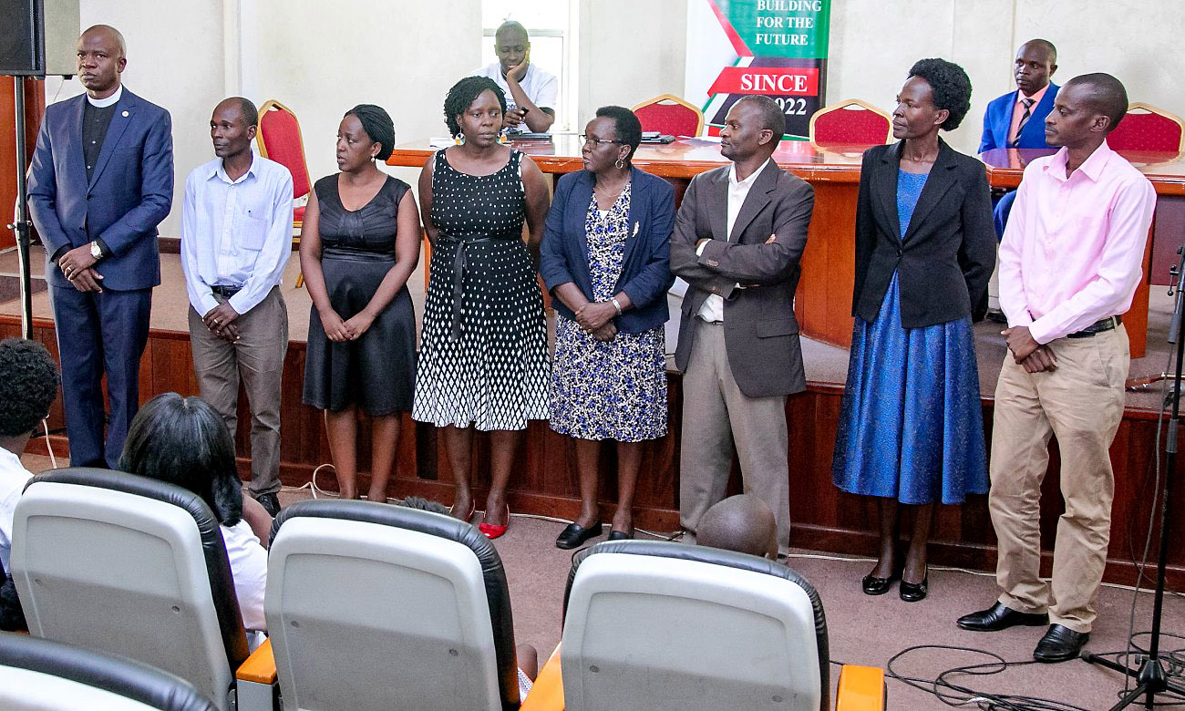 L-R: St. Francis Chaplain-Rev. Can. Onesimus Asiimwe, Mr. Samuel Kapasa, Ms. Christine Ninsiima (Treasurer), Dr. Barbara Nerima, Dr. Norah Jessica Aguti, Dr. Chris Tuhirirwe (Chairperson), Mrs. Josephine Apolot Opolot (Vice Chairperson) and Mr. Grace Musiime (Publicity Secretary) during the inauguration of the Joint Staff Fellowship Steering Committee on 13th September 2019, Makerere University, Kampala Uganda.