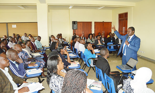 Prof. William Bazeyo speaking at the meeting with awardees.