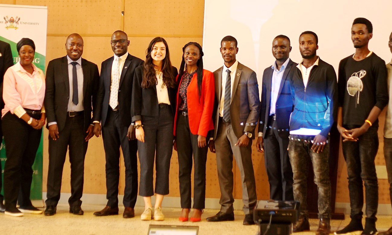 The Winning Team VepoxFilter (Right) pose for a group photo with Mr. Mugisha Patrick (2nd Left), Judges and Silver Walugembe, Director-Hult Prize Makerere University (3rd Right) after the Grand Finale on 9th December 2019, Central Teaching Facility 2 (CTF 2), Makerere University, Kampala Uganda.