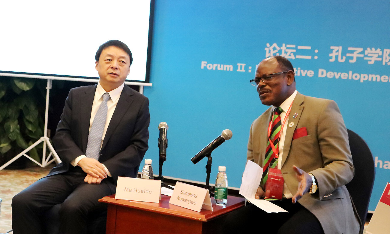 The Vice Chancellor-Prof. Barnabas Nawangwe (Right) and Prof. Ma Huaide (Left) moderate the debate on "Highlighting the Role of Chinese and Host Institutions in Confucius Institute Operation” during Day 2 of the Chinese Language Education Conference, 10th December 2019, Changsha, China.