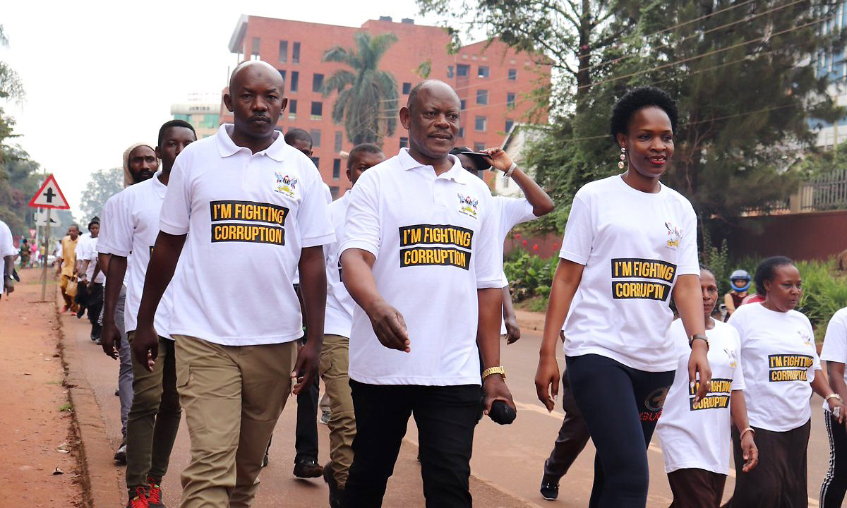 The Makerere University Vice Chancellor-Prof. Barnabas Nawangwe (Second Left) joined by other participants makes his way to the Constitutional Square for the #AntiCorruptionWalk on 4th December 2019, Kampala Uganda.