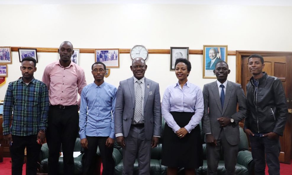 The Vice Chancellor-Prof. Barnabas Nawangwe (Centre) and Dr. Allen Kabagenyi (3rd Right) with some of the beneficiaries from Makerere and Addis Ababa Universities during the meeting on 3rd December 2019, Makerere University, Kampala Uganda.