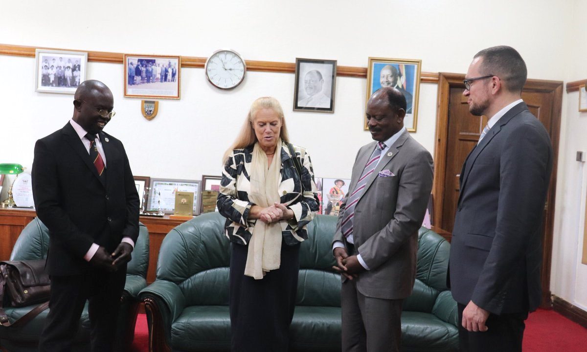 The Vice Chancellor-Prof. Barnabas Nawangwe (2nd Right) and Ms. Beate Schindler-Kovats (2nd Left) chat as Dr. Muhammad Kiggundu Musoke (Left) and Mr. Steven Heimlich (Right) listen during the visit on 28th November 2019, Makerere University, Kampala Uganda.