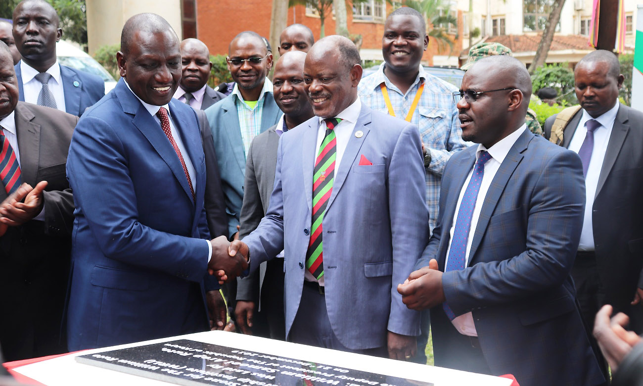 H.E. the Deputy President of the Republic of Kenya-Dr. William Samoei Ruto (Left) shakes hands with the Vice Chancellor-Prof. Barnabas Nawangwe after unveiling the Foundation Stone for the WSR Institute at Makerere University, Kampala Uganda on 21st December 2019.