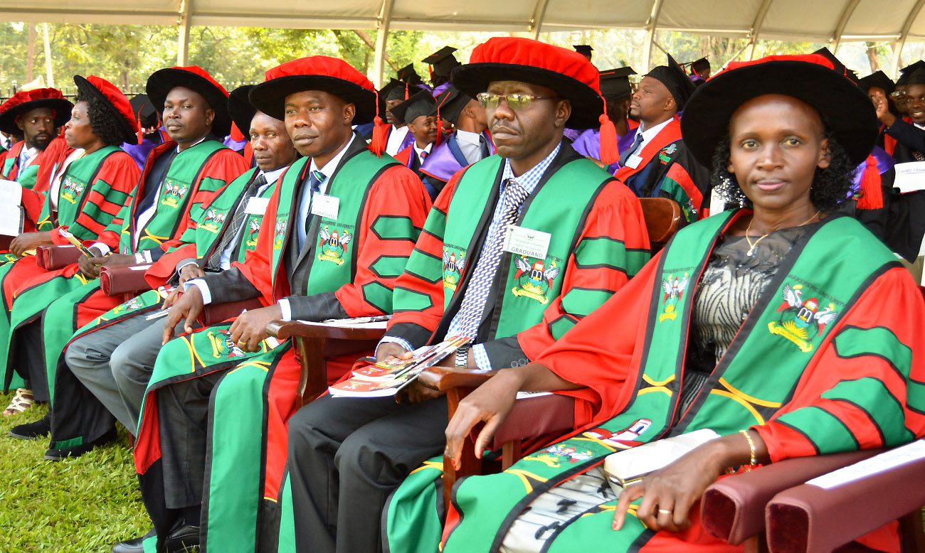 R-L: CAES PhD graduands; Ms. NATABIRWA Hedwig, Mr. ONYILO Francis, Mr. OPOLOT Henry Nakelet, Mr. ORIANGI George and Mr. WASUKIRA Arthur with other Graduands during Day 1 of the 70th Graduation Ceremony, 14th January 2020, Makerere University, Kampala Uganda.