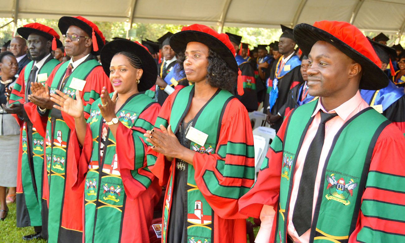 R-L: PhD Graduands; Mr. MASABO Emmanuel, Ms. NAKIBUULE Rose, Ms. NINA Olivia, Mr. OMODA-ONYAIT Godfrey & Mr. YAJJ Nuol Aywel Madut on Day 2 of the 70th Graduation Ceremony, 15th January 2020, Makerere University, Kampala Uganda.