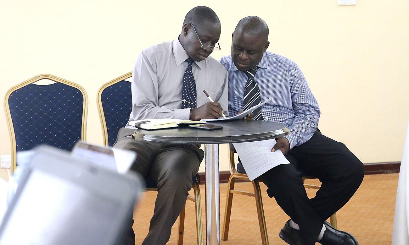 The Study’s Principal Investigator in Uganda-Dr. Richard Kajura (Left) confers with Dr. Peter Waiswa (Right) at the inception meeting held on 28th January 2020, Golf Course Hotel, Kampala Uganda.