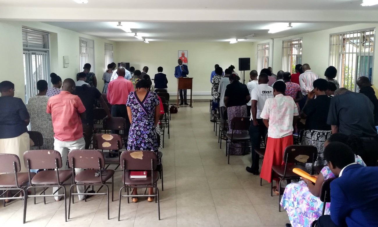 The Chaplain St. Francis Chapel-Rev. Can. Onesimus Asiimwe (Centre) delivers the benediction at the Joint Staff Christian Fellowship on 30th January 2020, St. Francis Students' Centre Upper Hall, Makerere University, Kampala Uganda.