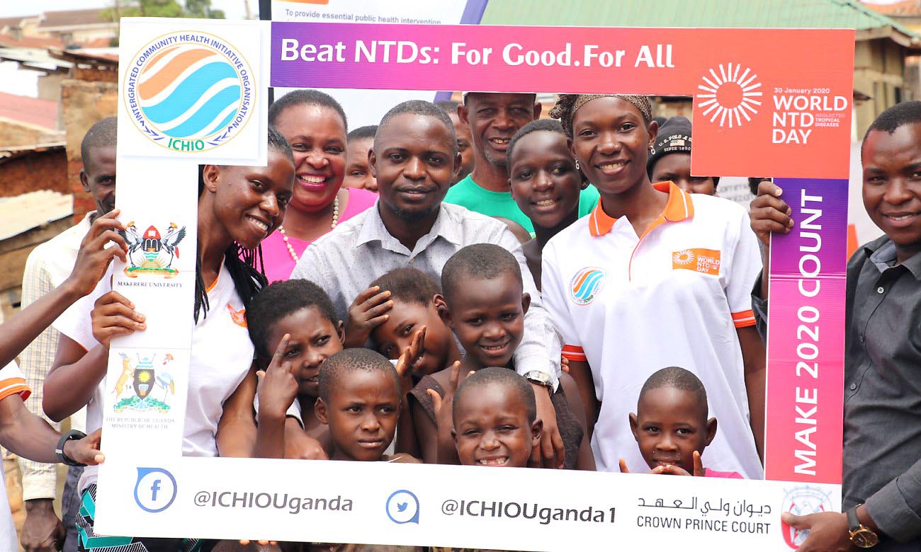 ICHIO members share a “Kodak” moment with the children in Katoogo during the First-ever NTDs Day Celebrations on 30th January 2020, Gaba, Kampala Uganda.