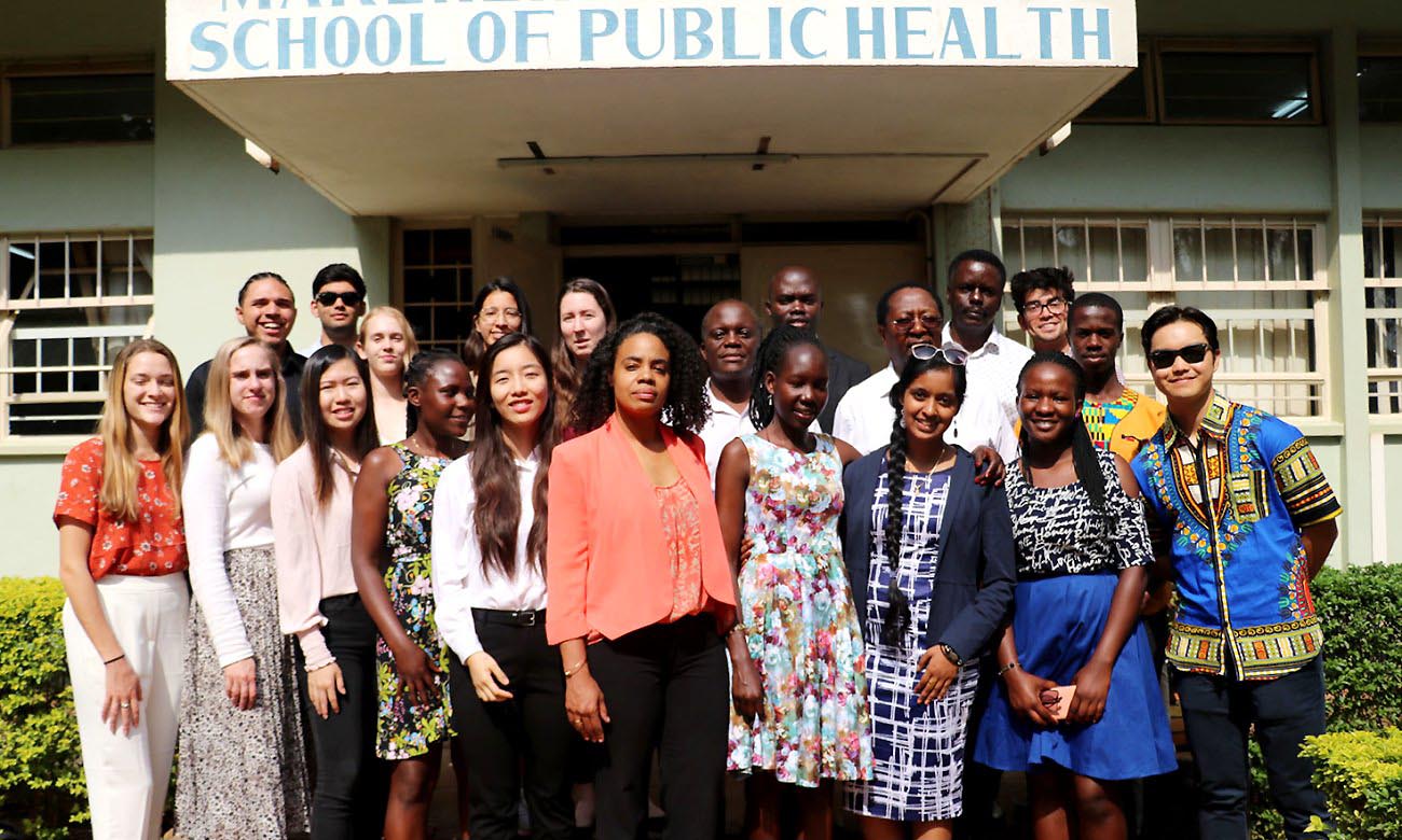 MakSPH Staff led by Deputy Dean-Prof. Fredrick Makumbi (2nd Row 3rd Right) pose for a photo after the seminar with students who took part in the mentorship program, at MakSPH, Mulago Campus, Makerere University, Kampala Uganda. 2nd Row 2nd Right is former MakSPH Dean Prof. David Serwadda.