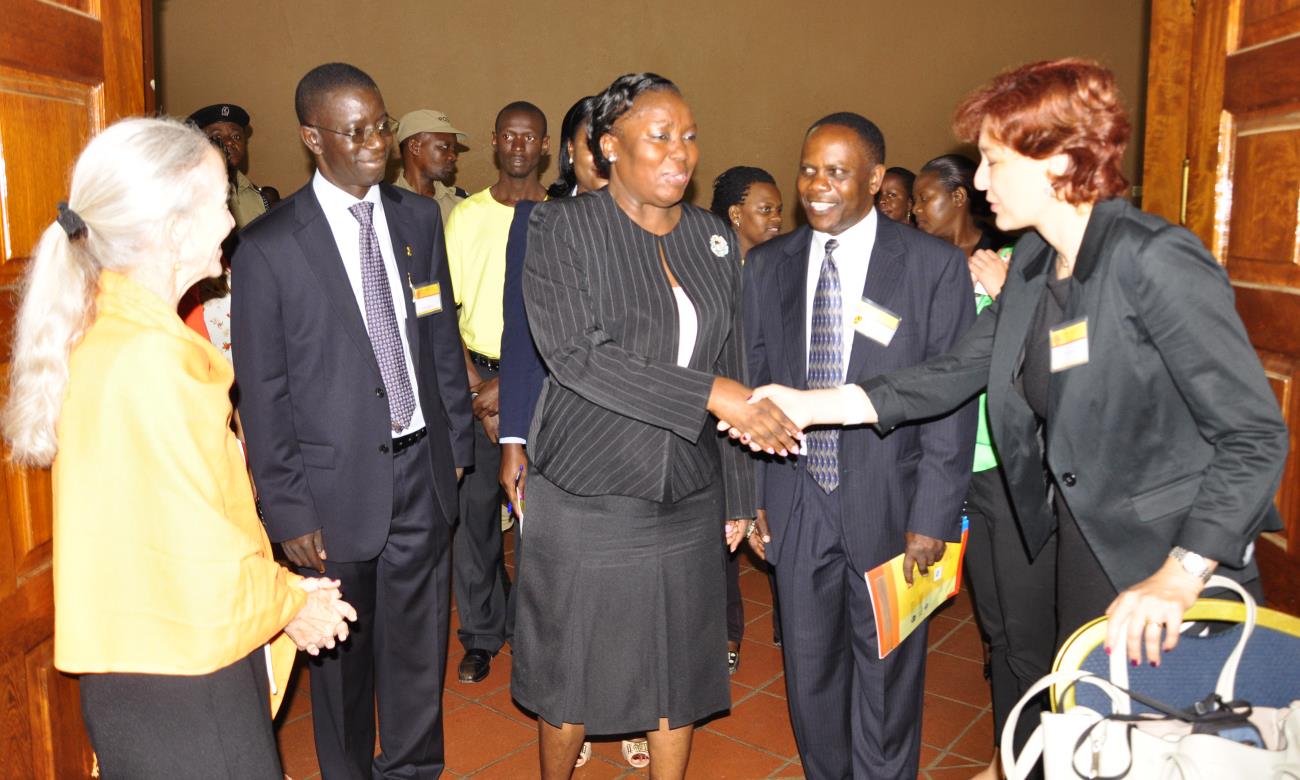 The Speaker of Parliament, Rt. Hon. Rebecca Kadaga (Centre) flanked by Prof. Edward Kirumira (2nd Left) and Prof. Hugo Kamya (2nd Right) interacts with participants at the 18th Biennial International Consortium for Social Development (ICSD) Symposium, Kampala on 16th July 2013. The 18th Biennial ICSD was hosted by the College of Humanities and Social Sciences (CHUSS), Makerere University, Kampala Uganda.