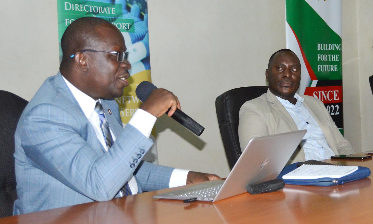 The Director DICTS-Mr. Samuel Paul Mugabi (Right) listens as Mr. Hussein Isingoma responds to a question during the Social Media Workshop on 13th February 2020, Conference Hall, CEDAT, Makerere University, Kampala Uganda.