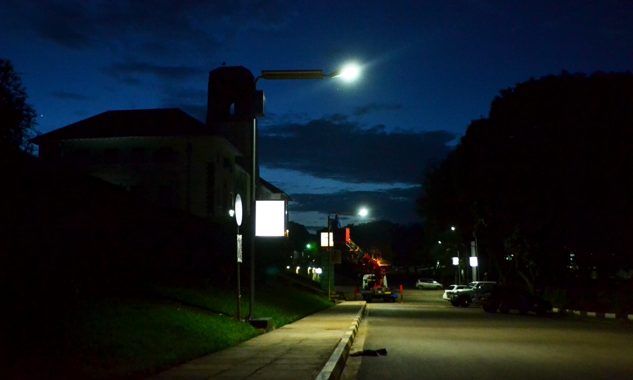 Installation of Solar Street Lighting in front of the Main Building, University Road, Makerere University. Date taken: 25th June 2014.