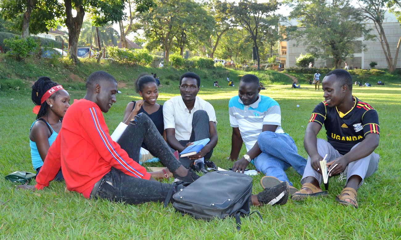 A group of students holds a discussion in the Freedom Square, Makerere University, Kampala Uganda. Date taken: 12th March 2019. A psychological family is important for your mental and physical health.