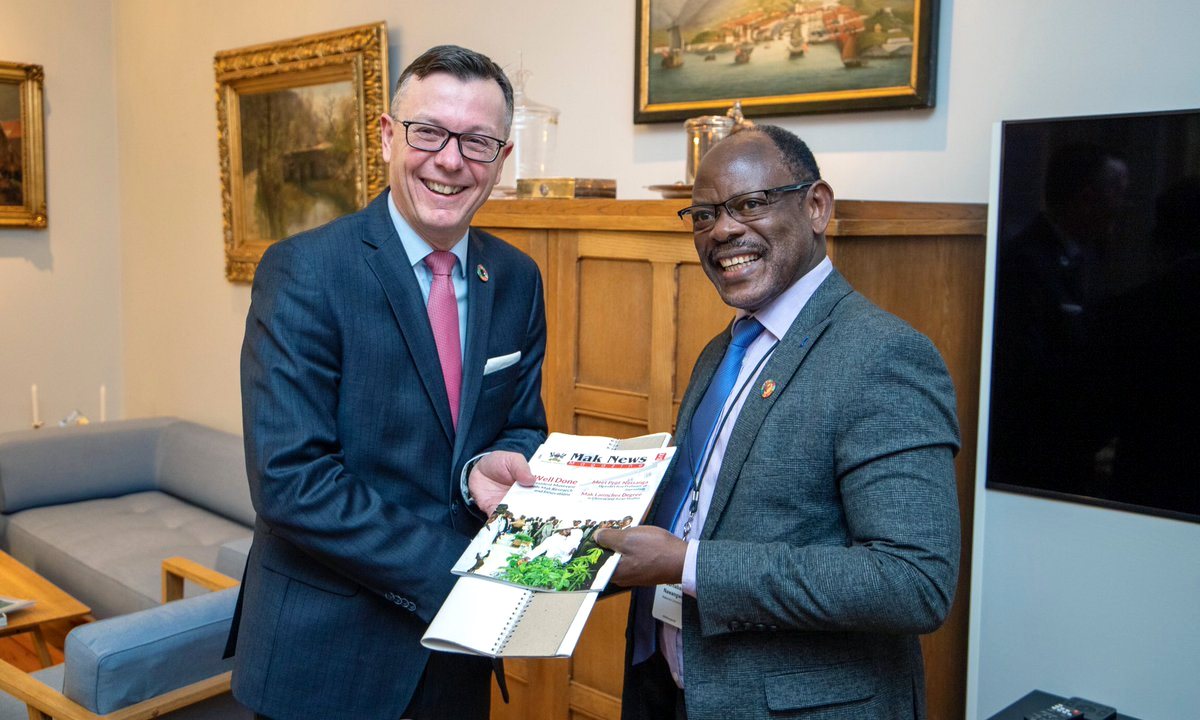 The Vice Chancellor-Prof. Barnabas Nawangwe (Right) hands over the latest editions of the Mak News Magazine and Calendar to UiB Rector-Prof. Dag Rune Olsen (Left) during the meeting on 7th February 2020 in Bergen, Norway.