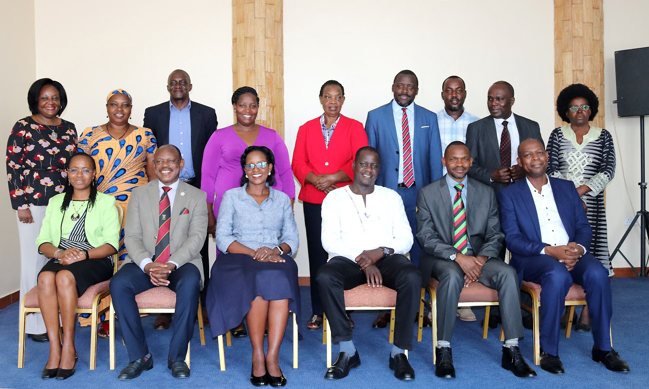 Front Row: The Chairperson Council-Mrs. Lorna Magara (3rd Left) and Vice Chairperson Council-Rt. Hon. Daniel Fred Kidega (3rd Right) with L-R: Dr. Sarah Ssali, Vice Chancellor-Prof. Barnabas Nawangwe, DVCAA-Dr. Umar Kakumba and Dr. Vincent Ssembatya. Standing L-R: Prof. Rhoda Wanyenze, Dr. Euzobia B. Mugisha, Mr. Gilbert Arikosi, Dr. Helen N. Nkabala, Prof. Helen Byamugisha, Mr. Yusuf Kiranda, Mr. Bruce B. Kabaasa, Dr. John Mango and Dr. Monica Musenero Masanza at the Retreat, 5-7 March 2020, Entebbe Uganda