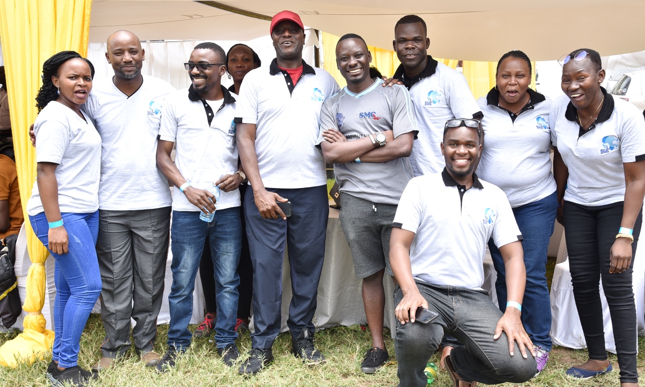 The Executive Director IDI-Dr. Andrew Kambugu (Red Cap) with staff from the Infectious Diseases Institute (IDI) during the Second Annual ONE-IDI Gathering, 14th February 2020, Legends Sports Grounds, Kampala Uganda.