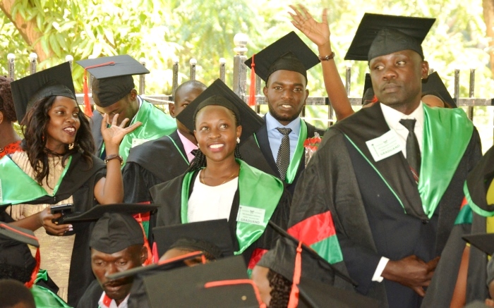 The Best Overall Sciences Student Ms. Namayengo Sarah (Left) joins fellow Graduands of the Bachelor of Conservation Forestry & Product Technology in celebration on Day 1 of the 70th Graduation Ceremony, 14th January 2020, Freedom Square, Makerere University, Kampala Uganda.