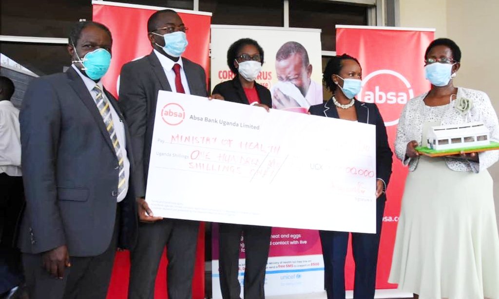 The Ag. DVCFA-Prof. William Bazeyo (Left) and the PS Ministry of Health-Dr. Diana Atwine (Right) during the handover of four EpiTents donated by the Absa Team (Centre) on 28th April 2020, Kampala Uganda.