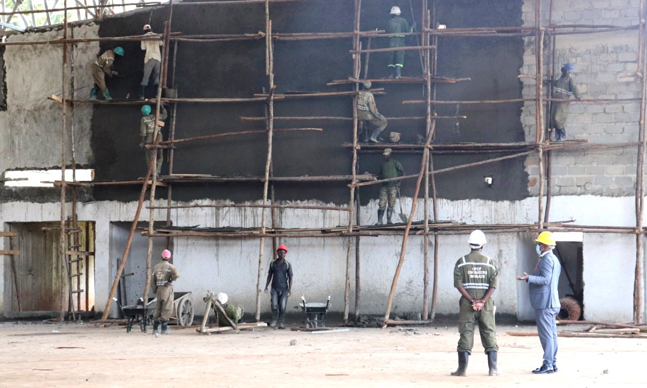 The Vice Chancellor, Prof. Barnabas Nawangwe (Right) inspects expansion works on the Makerere University Arena being undertaken by the UPDF Engineering Brigade on 24th June 2020, Kampala Uganda.