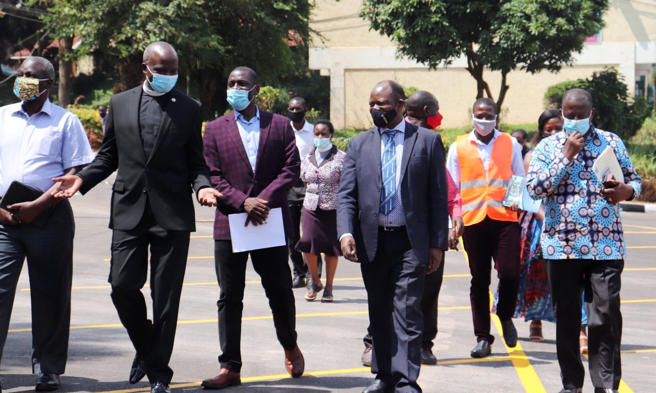 The Vice Chancellor, Prof. Barnabas Nawangwe (4th Left), St. Francis Chaplain-Rev. Can. Onesimus Asiimwe (2nd left) and Members of the Chapel Council tour the newly repaved parking lot on 26th June 2020, Makerere University, Kampala Uganda.