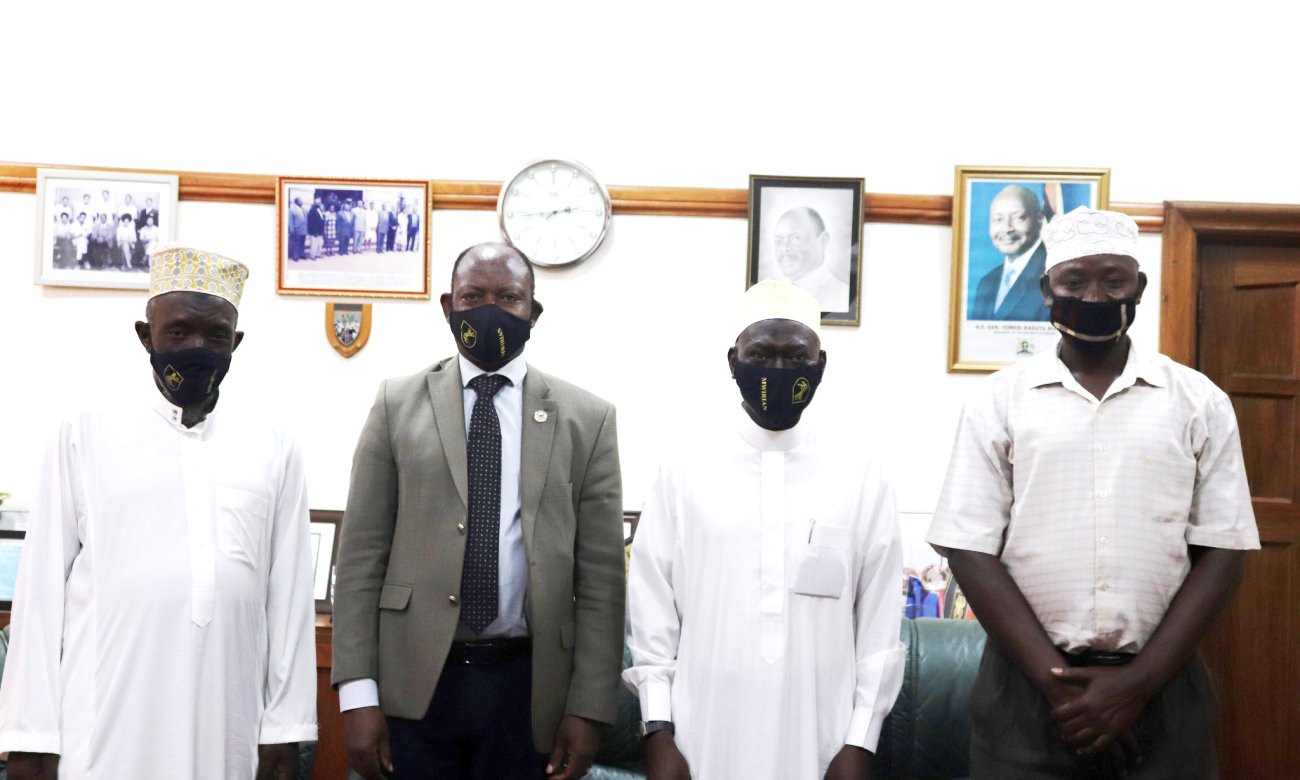 The Vice Chancellor, Prof. Barnabas Nawangwe (2nd Left) with L-R: Prof. Abasi Kiyimba, New Imam-Sheikh Sowedi Juma Mayanja and another official during the brief welcome ceremony on 1st July 2020, Makerere University, Kampala Uganda.