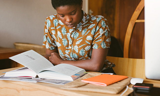 Student reading a book