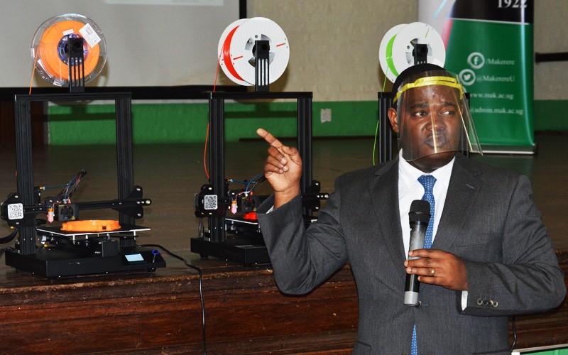 Prof. Noble Banadda-Project PI and Chair, Department of Agricultural and BioSystems Engineering explaining how 3D printed face shields are made at a press conference held on 28th August 2020 in the Main Hall, Makerere University, Kampala Uganda.