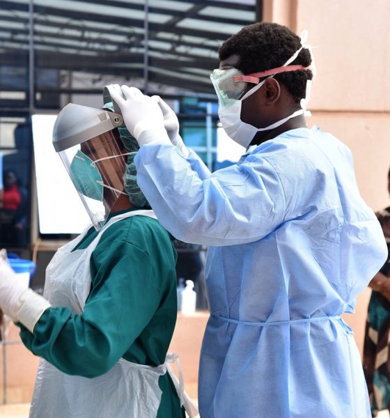 Staff from IDI and the Ministry of Health engage in Personal Protective Equipment demonstrations after a two-day progam to spearhead the rollout of COVID-19 Infection Prevention and Control (IPC) guidelines on 27th April 2020 at the IDI-McKinnell Knowledge Center, Makerere University, Kampala Uganda.