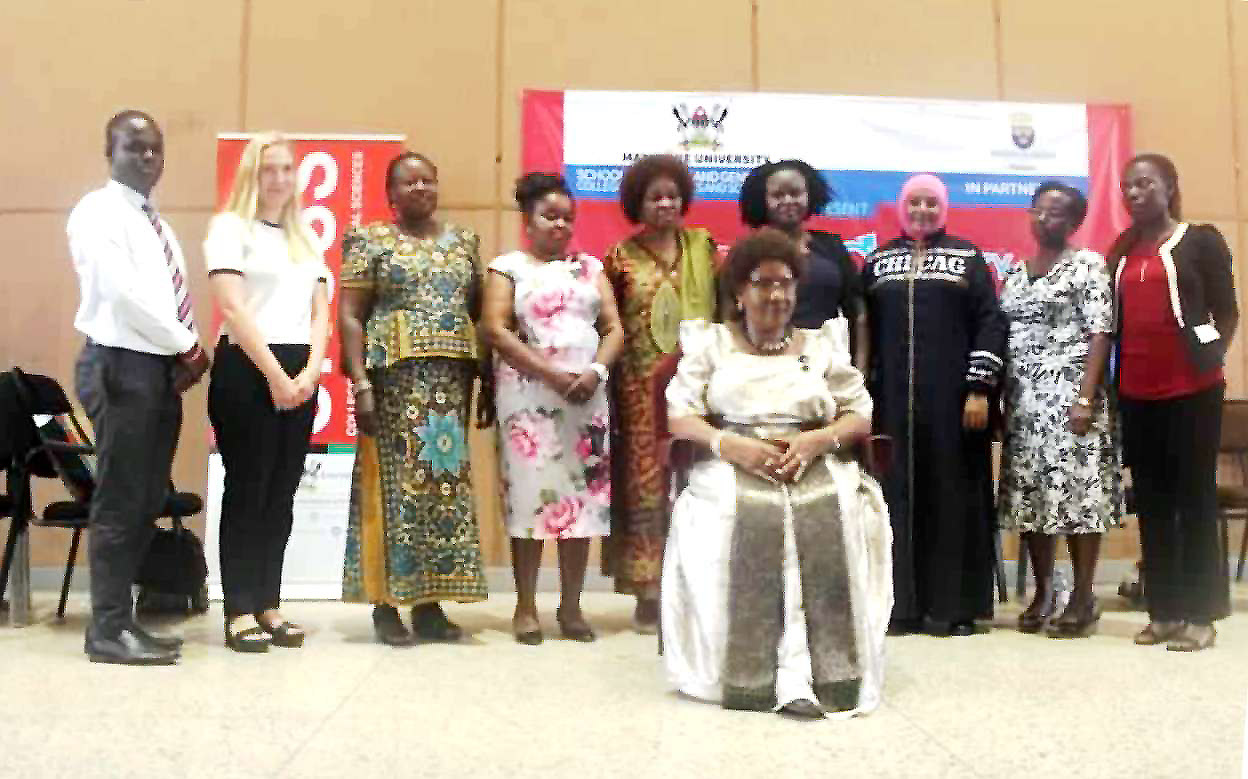 The Namasole (Mother of the King) Margaret Nagawa Siwoza Muyanja with the panelists namely; Ms. Joanita Kawalya (4th L), Mrs. Elizabeth Lwanga (5th L), Ms. Despina Namwembe (4th R), Mrs. Tugulwa (3rd R), Mrs. Sseggujja (2nd R), Ms. Nakizito (R) as well as representatives from the Swedish Embassy and Dr. Florence Ebila (3rd L) during the launch on 2nd March 2020, CTF2 Auditorium, Makerere University, Kampala Uganda.