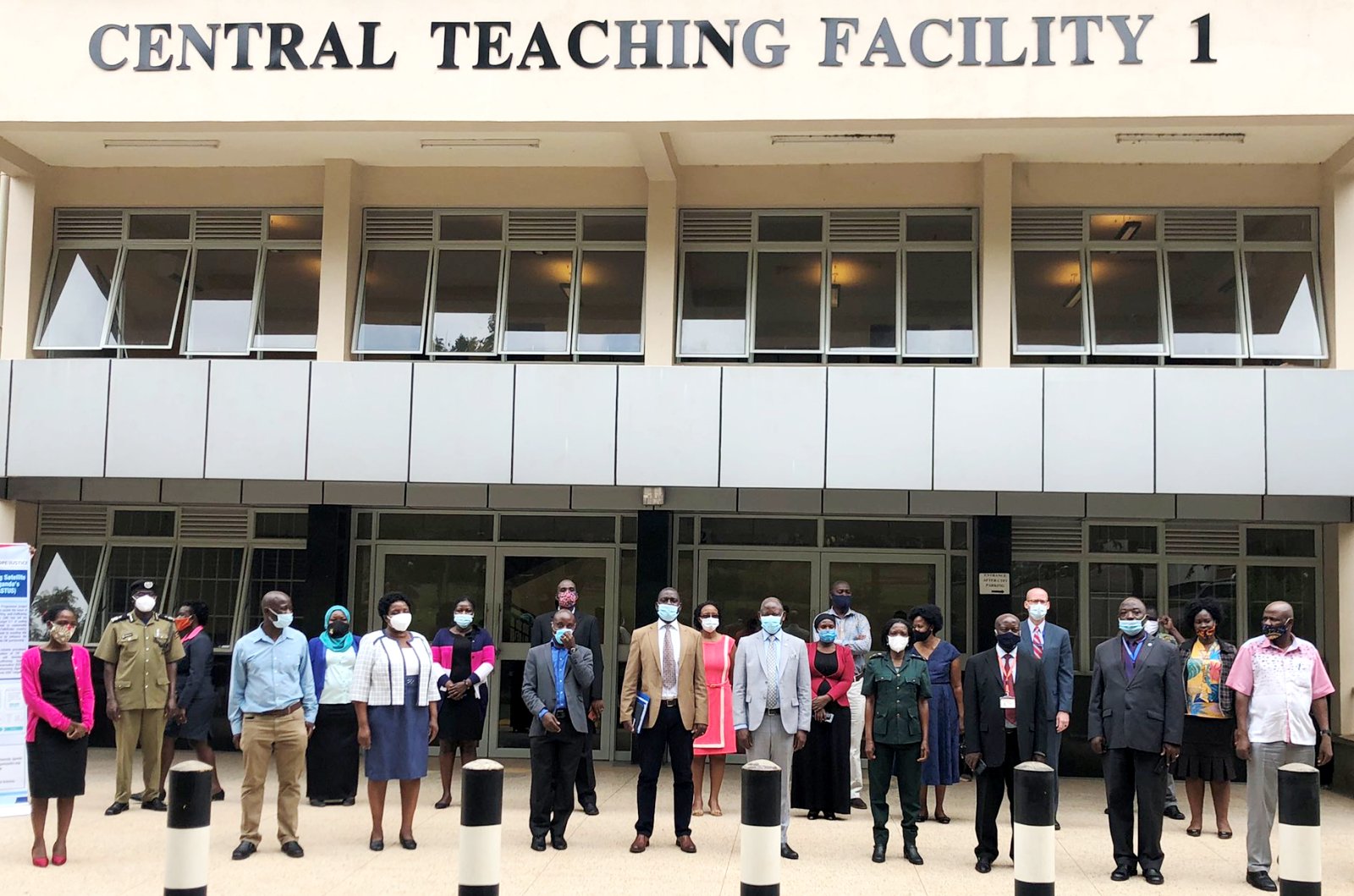 The Vice Chancellor-Prof. Barnabas Nawangwe (Front row grey suit) poses for a group photo with stakeholders who took part in the ASTUS meeting held in the Multimedia Studio, CTF1, Makerere University, Kampala Uganda.