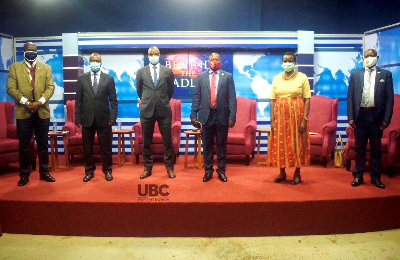The Vice Chancellor-Prof. Barnabas Nawangwe (Right) with other Panelists and Host-Charles Odongtho (Left) after the Behind The Headlines show on UBC TV that aired on 23rd September 2020.