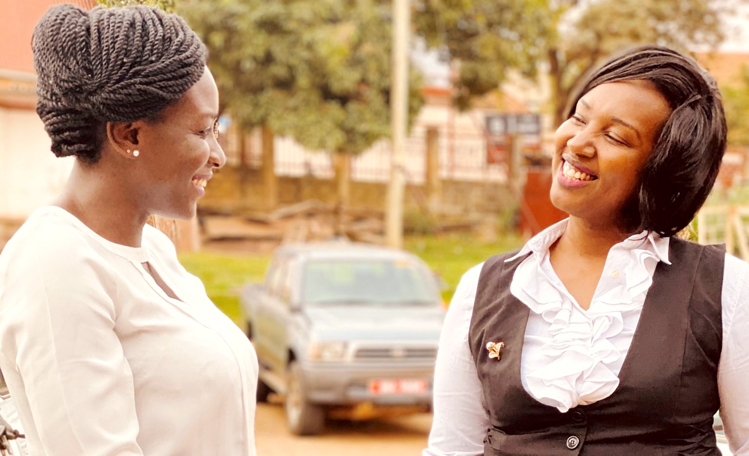 The President and Vice President-elect of the Uganda Law Society (ULS), Pheona Nabasa Wall (Right) and Diana C. Angwech (Left) chat at an earlier occasion. They are both alumnae of Makerere University. Photo credit: Twitter/@ByaruhangaAnita