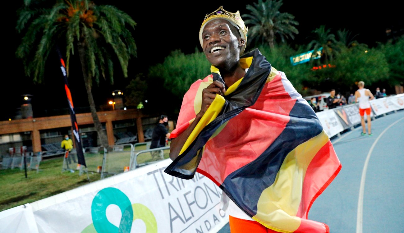 Joshua Cheptegei poses with the Crown shortly after setting a New World Record at the NN World Record Day on 7th October 2020 in Valencia Spain. Photo credit: Twitter/@joshuacheptege1