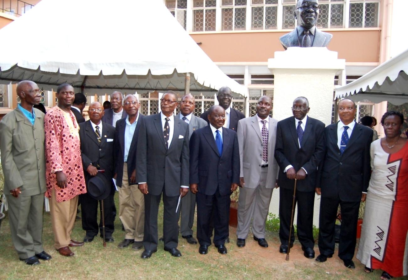 Two-time Vice Chancellor and proud teacher-Prof. William Senteza Kajubi (3rd Right) and a host of other dignitaries pose for a group photo on 20th December 2010 after Makerere University unveiled a bust immortalising him at the School of Education.