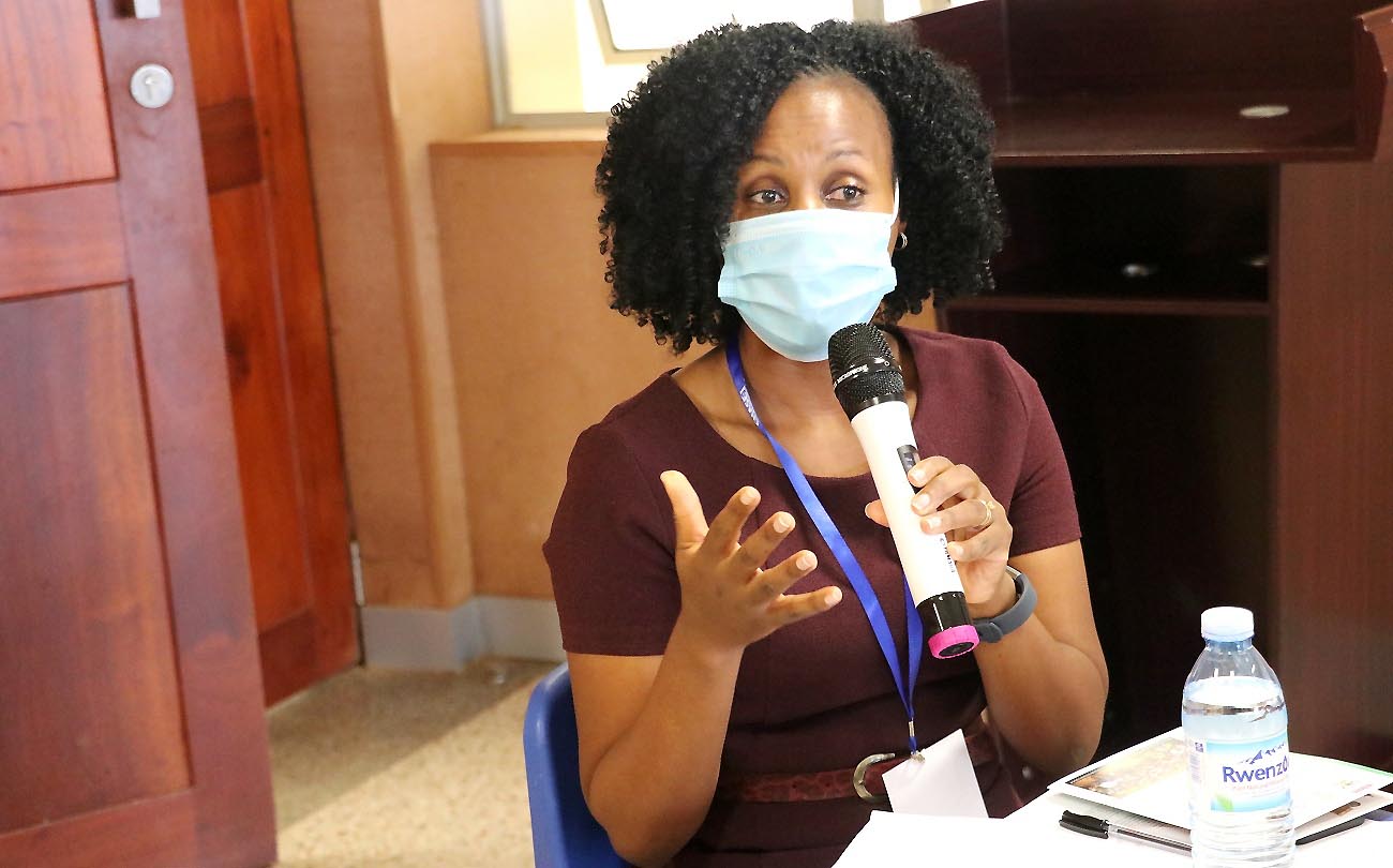 Dr. Gloria Seruwagi, the Principal Investigator-REFLECT study responds to questions at the event where preliminary findings were shared, 20th October 2020, CTF1, Makerere University, Kampala Uganda.