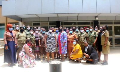 The Principal CHUSS-Dr. Josephine Ahikire (Centre in blue) and Director RPC-Dr. Helen Nambalirwa Nkabala (Centre black & white) with Facilitators, UPDF, UPF and UPS Officers that took part in the UNSCR 1325 training on 11th October 2020, CTF1, Makerere University, Kampala Uganda.