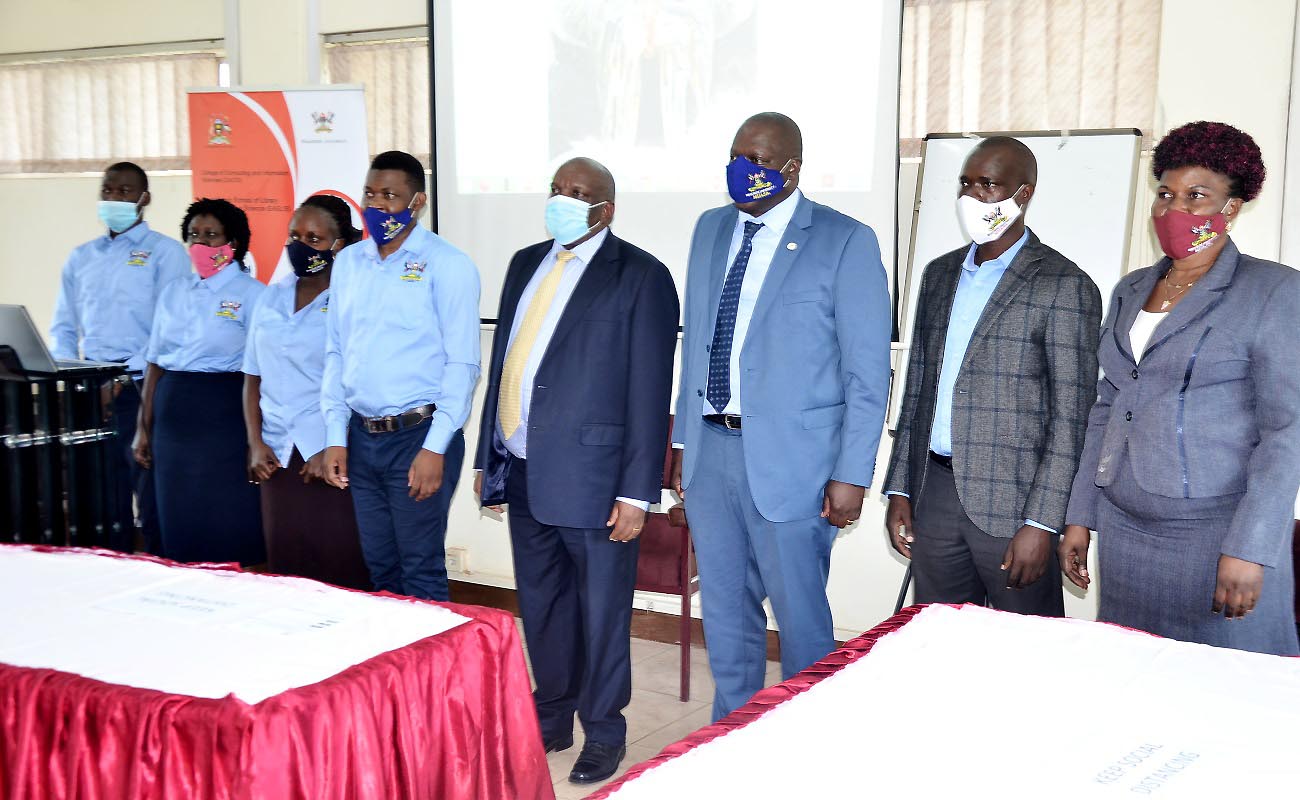 The State Minister for Karamoja-Hon. Moses Kizige (4th R), Principal CoCIS-Prof. Tonny Oyana (3rd R) and Dr. Joyce Bukirwa (R) pose for a group photo with the Project Team after the Research Dissemination on 13th October 2020, CoCIS, Makerere University, Kampala Uganda.