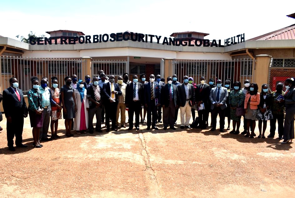 The Vice Chancellor-Prof. Barnabas Nawangwe (Centre) poses for a group photo with the Principal CoVAB-Prof. J.D. Kabasa, the VAMS Project team and participants after the launch on 30th September 2020, Centre for Biosecurity and Global Health, CoVAB, Makerere University, Kampala Uganda.