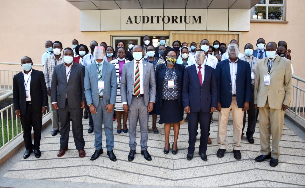 Vice Chancellor-Prof. Barnabas Nawangwe (4th L), DVCAA-Dr. Umar Kakumba (3rd L), Fmr. DVCAA-Dr. Ernest Okello-Ogwang (R), Director DRGT-Prof. Buyinza Mukadasi (3rd R) and other officials pose for a group photo with NERLP Research Teams after the research dissemination workshop on 28th October 2020, CTF2, Makerere University, Kampala Uganda.