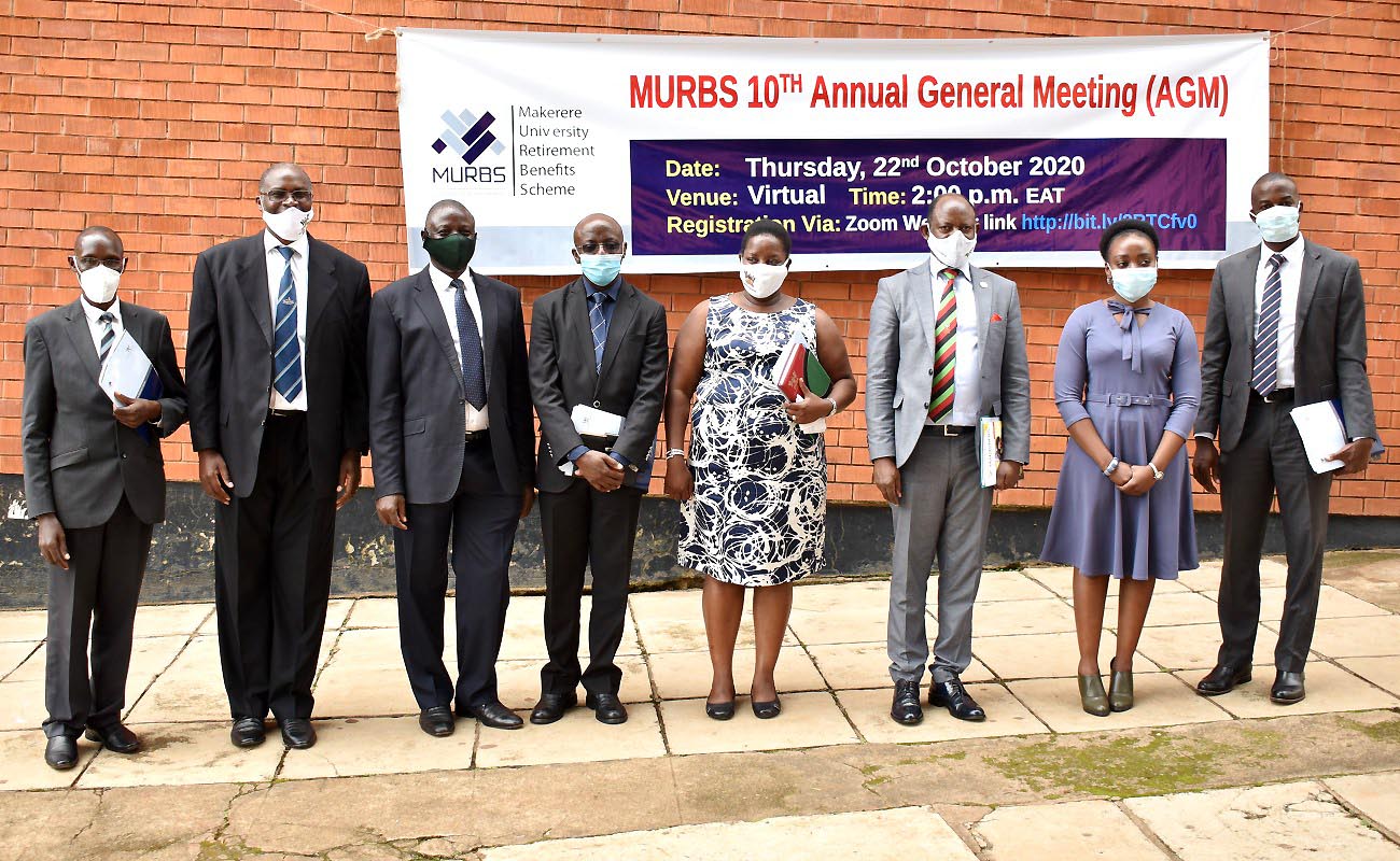 Dr. Helen Nambalirwa Nkabala (4th Right) Representing Chairperson Makerere University Council, Vice Chancellor Prof. Barnabas Nawangwe (Third Right) and Chairperson BoT MURBS-Dr. Godwin Kakuba (4th Left) with L-R: Mr. Bruce Twesigye, Mr. Wilber Grace Naigambi, Mr. William Ndoleriire, Ms. Susan Khaitsa and Mr. Ssenyonga Cosmas after the meeting on 20th October 2020, CoBAMS, Makerere University, Kampala Uganda.