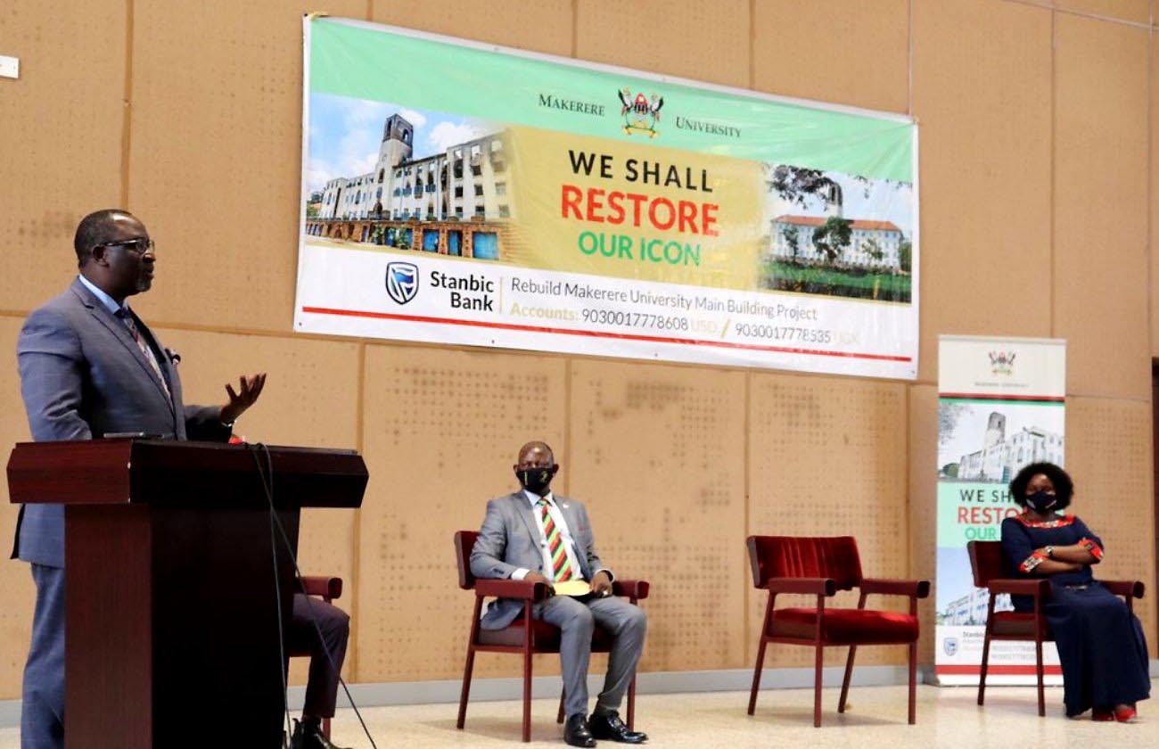 Deputy Katikkiro-Owek. Robert Waggwa Nsibirwa (Left) addresses the audience during his visit to deliver the Katikkiro's message of solidarity following the Main Building fire as the Vice Chancellor-Prof. Barnabas Nawangwe (Centre) and Buganda Minister for Youth, Sports and Recreation-Dr. Prosperous Nankindu Kavuma (Right) listen on 1st October 2020, CTF2 Auditorium, Makerere University, Kampala Uganda.