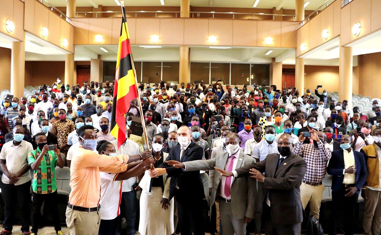 Israeli Ambassador-H.E. Oded Joseph and Honorary Consul-Ms. Ishta Asiimwe Kutesa (Centre) are joined by the Vice Chancellor-Prof. Barnabas Nawangwe (2nd R) and Mr. Agaba Issa Mugabo (R) to flag of the contingent of students on 29th October 2020, CTF2, Makerere University, Kampala Uganda.