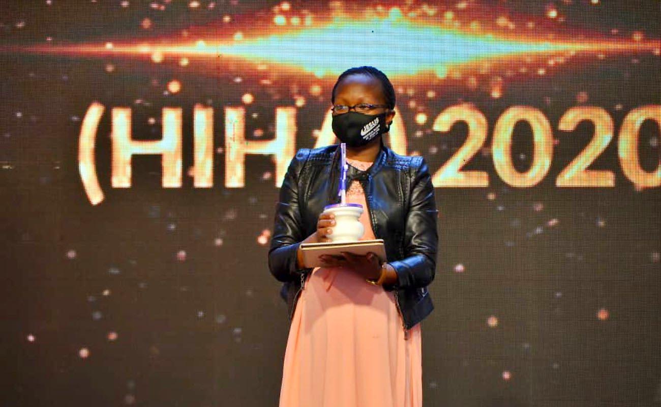IDI's Shamim Nakadde poses with the Pharmacist of the Year trophy at the HIHA 2020 Awards held on 6th November 2020. Photo credit: Twitter/@MinofHealthUG