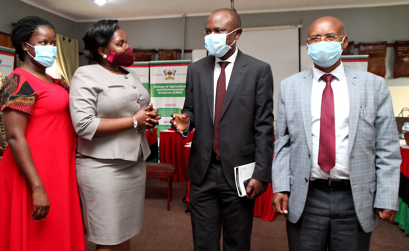 The Research Team: PI-Dr. Losira Nasirumbi Sanya (2nd L), Co-PI-Prof. Johnny Mugisha (R) and EPRC Research Analyst-Ms. Florence Nakazi (L) chat with Ag. DVCAA and Principal CoBAMS-Assoc. Prof. Eria Hisali (2nd R) after the Dissemination on 18th November 2020, Conference Room, SFEGS, CAES, Makerere University, Kampala Uganda.