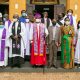 The Archbishop of the Church of Uganda-Rt. Rev. Dr. Stephen Kaziimba Mugalu (4th L) with the Vice Chancellor-Prof. Barnabas Nawangwe and his wife (4th R and 3rd R), St Francis Chaplain-Rev. Can. Onesimus Asiimwe (3rd L) and other members of the clergy and community after mass on 29th November 2020, St. Francis Chapel, Makerere University, Kampala Uganda.