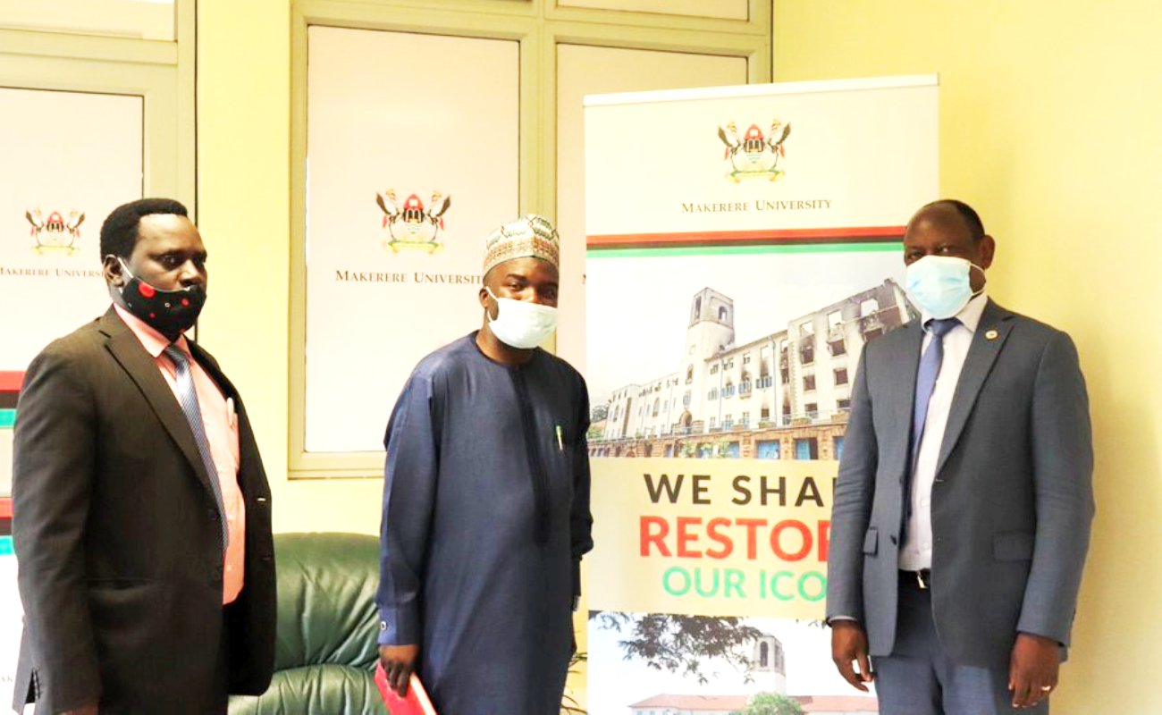 The Vice Chancellor-Prof. Barnabas Nawangwe (R) and Executive Secretary Kaduna State Scholarship Board-Mr. Hassan Rilwan (C) and another official during the meeting on 9th November 2020, CTF1, Makerere University, Kampala Uganda.