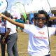 A team member poses for the camera during the exhibition at the UN Day, 24th October 2019, Kololo Airstrip, Kampala Uganda. Photo credit: Centres4Her